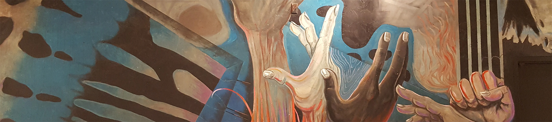 mural of hands reaching up